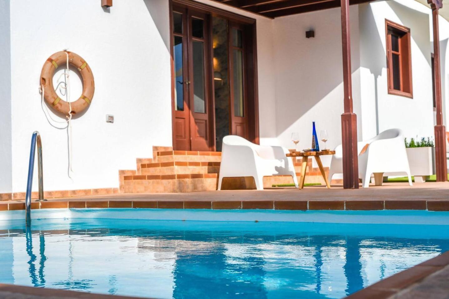 Agradable Y Familiar Con Piscina Casa Inima Villa Playa Blanca  Bagian luar foto