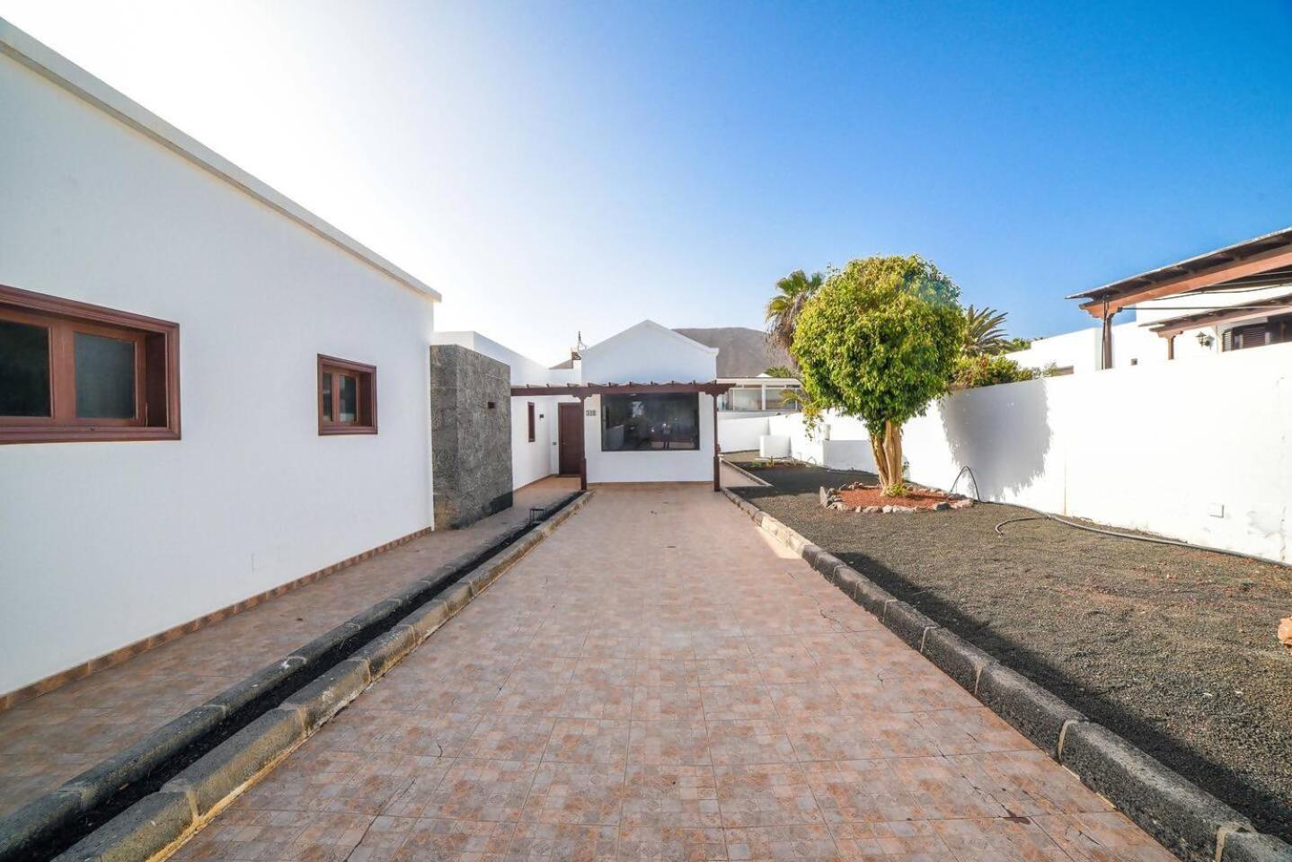 Agradable Y Familiar Con Piscina Casa Inima Villa Playa Blanca  Bagian luar foto