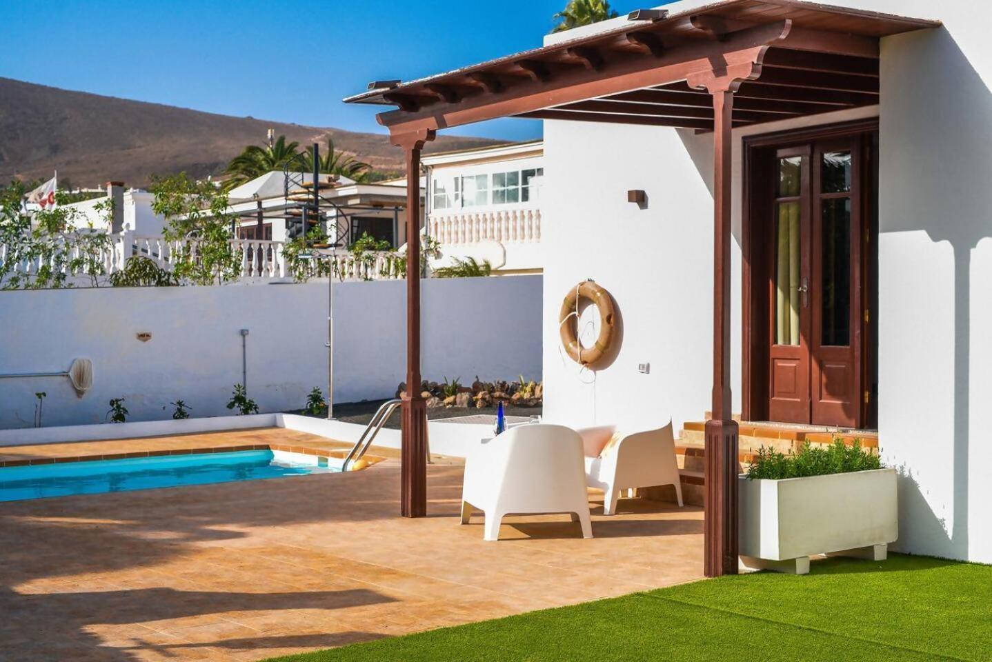 Agradable Y Familiar Con Piscina Casa Inima Villa Playa Blanca  Bagian luar foto